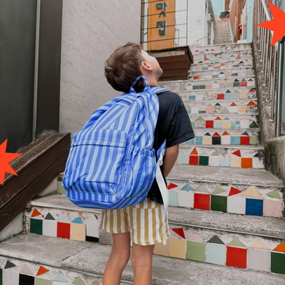 boy wearing paros backpack