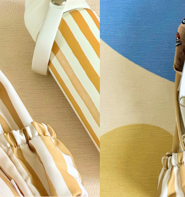 mustard stripe mini backpack with embroidered name Oliver, an ocean friends bucket hat and a construction crew mini lunch bag