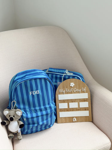 paros mini backpack with paros junior lunch bag and a first day board
